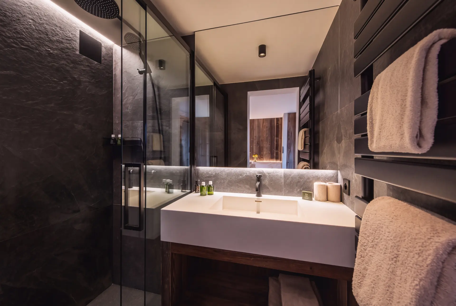 Bathroom with stone basin and skylight