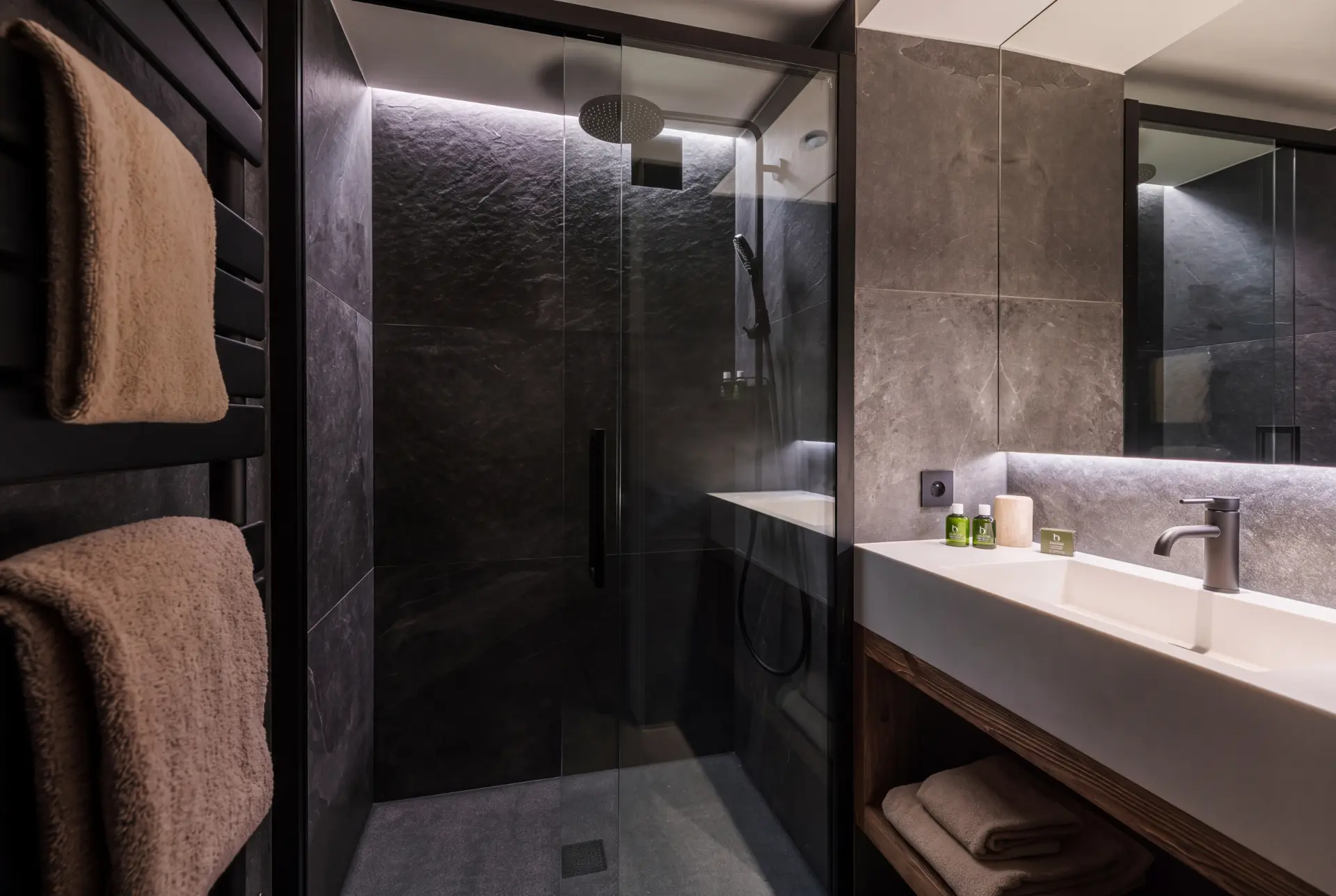 Bathroom with stone basin and skylight