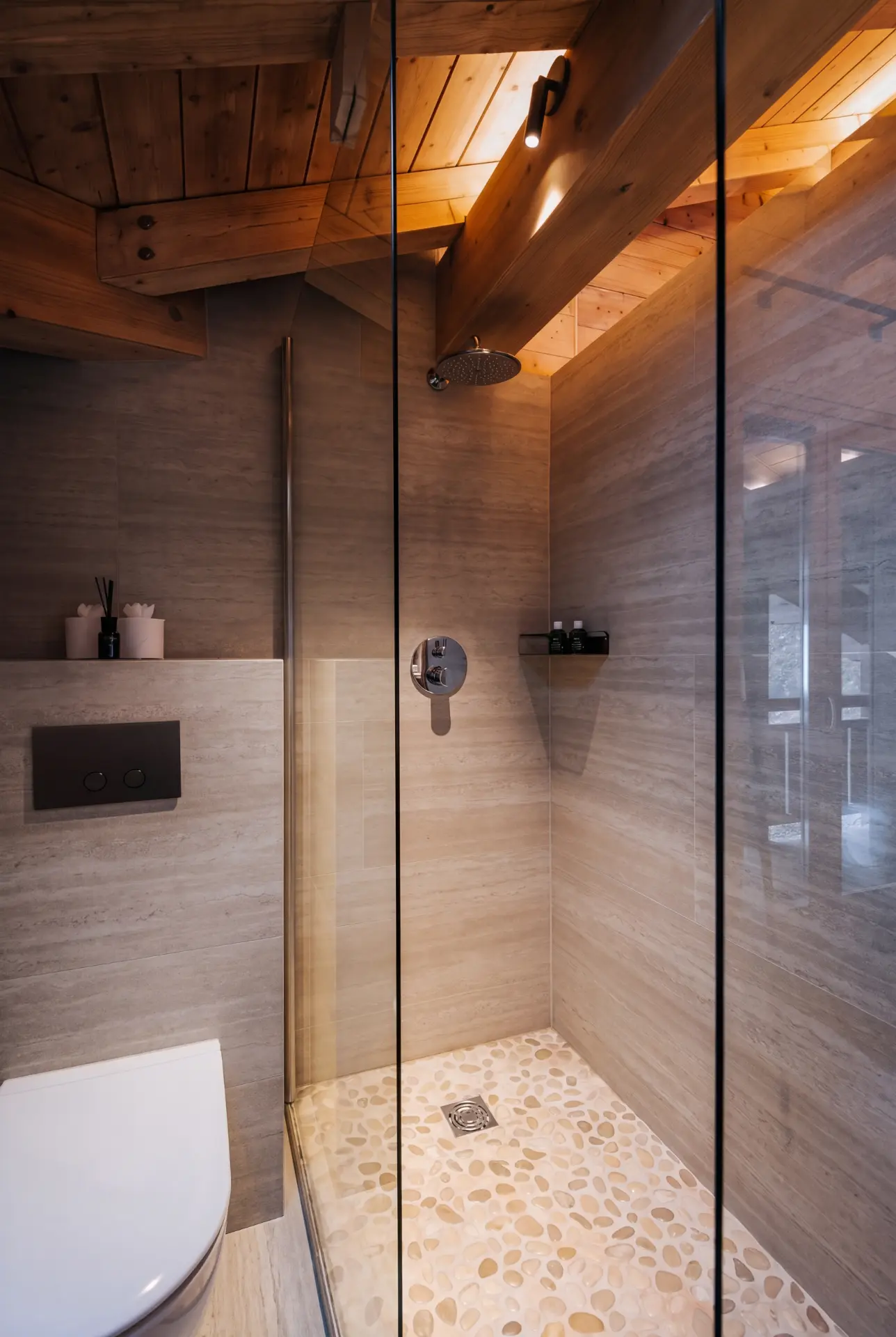 Dark stone bathroom with walk-in shower